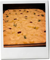 The raw dough being prepared for focaccia bread