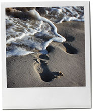 Footsteps in the sand to illustrate Hamtpons beach recipes